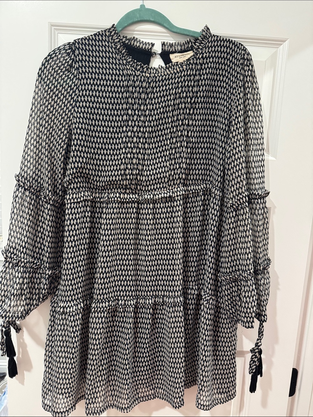 Black and White Tiered Mini Dress with Ruffle Details